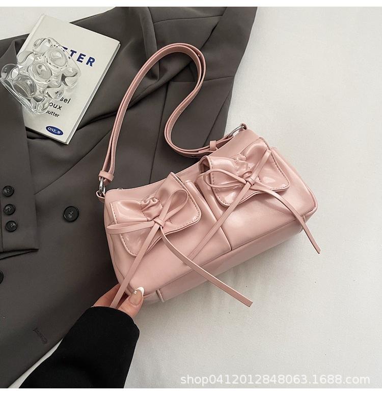 

Иностранный стиль супер огонь сумка на шнурке маленькая женская 2025 новая корейская версия нишевый дизайн сумка для поездок модная на плечо сумка-мессенджер розовый