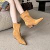 Autumn and winter new pointed thick heel high heel temperament French fashion sleeve suede short boots