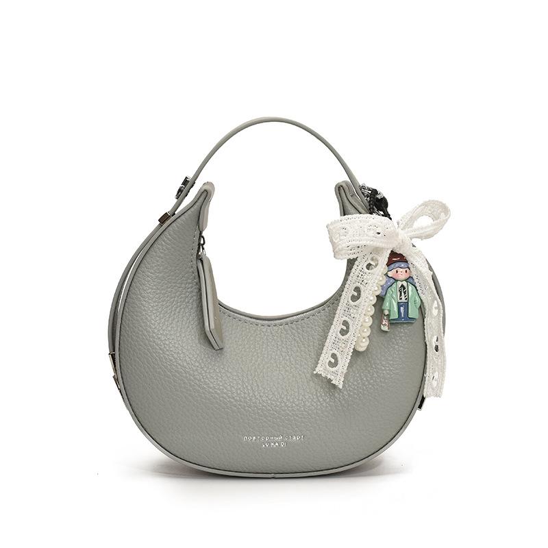 

New women s bags, popular shoulder bags, summer personalized portable small round bags, high-end underarm bags, oblique span bags No pendant синій