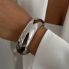 SHIXIN Hip Hop Liscio Colore Oro Larga Catena Bracciale a Molla per Donne Punk Metallo Geometrico Bracciale a Manchette Unisex Uomo Gioielli