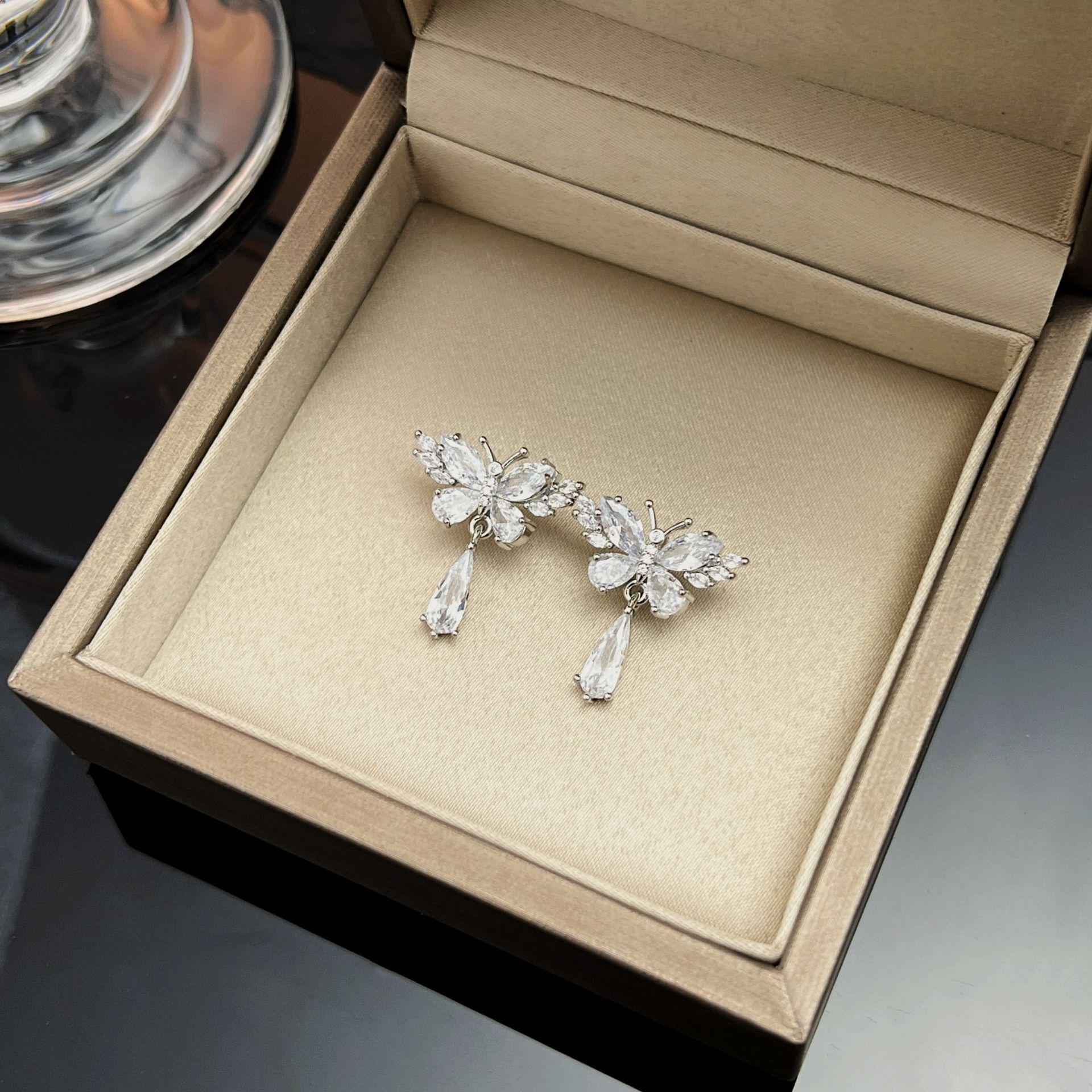 Niche High-End Zirconia Butterfly Earrings - 2024 Light Luxury 925 Silver Studs for Women