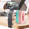 Universal Rotatable Travel Phone Holder: Portable Folding Clip for Live Broadcasts & Outdoor Use