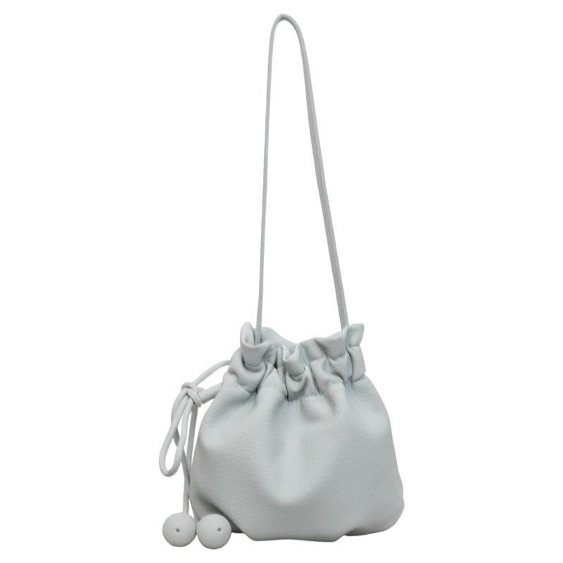2026 New Drawstring Bucket Bag for Women Soft Leather Crossbody Bag with Ball Charm Mini Shoulder Handbag for Daily Shopping