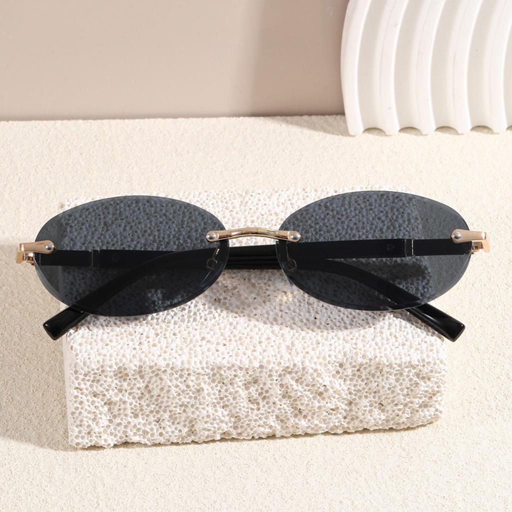 Trendy Cut Edge Personalized Oval Frame Sunglasses New Frameless Spicy Girl Hip-hop Sunglasses Metal WOMEN'S Sunglasses MEN'S Sunglasses