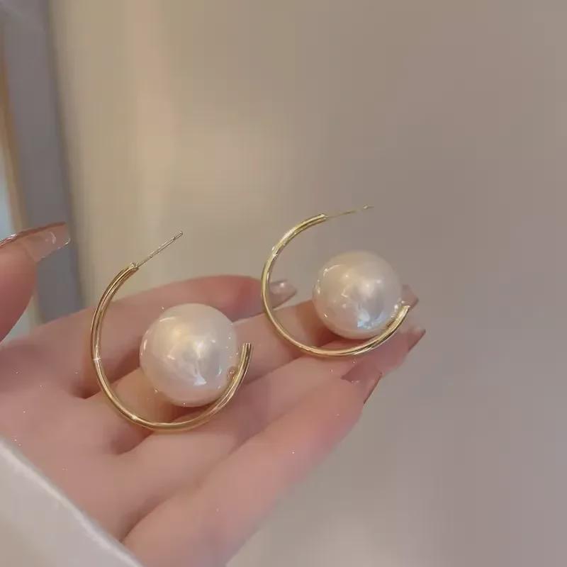 Women's 2023 High-End Large Pearl Earrings with Unique Design