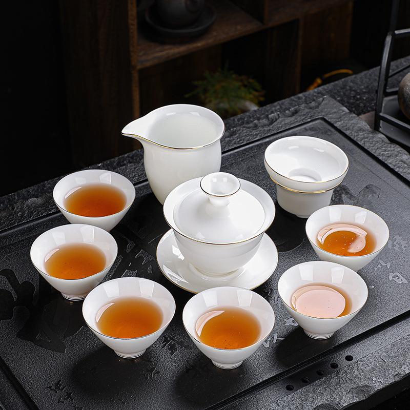 

Suet jade tracing tea set gift set creative ten-head white porcelain tea set set commercial holiday gift