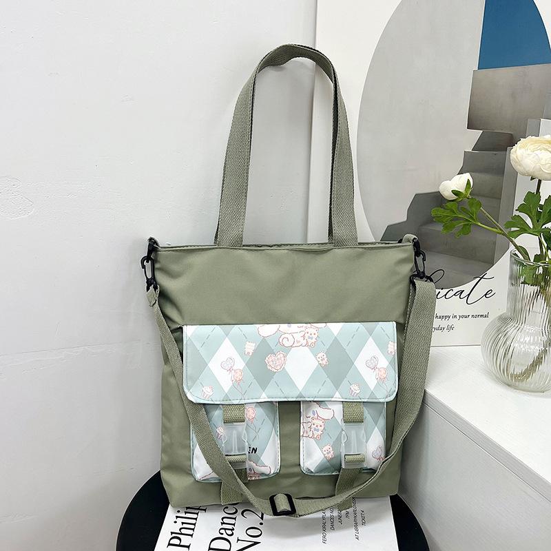 Large-capacity student tutoring bag, new women's bag, fashionable contrasting color messenger bag, shoulder bag.