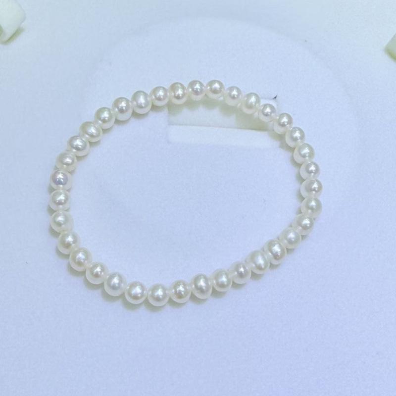 Zhuji Freshwater Pearl Bracelet: 4.5-5mm Near Round Pearls on a Durable Leather Cord