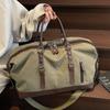 Retro Canvas Duffel Bag with Buckle Straps Large Capacity Travel Weekend Carry On Bag