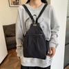 Solid color Japanese and Korean simple commuter small backpack, four-season daily large-capacity shoulder backpack.