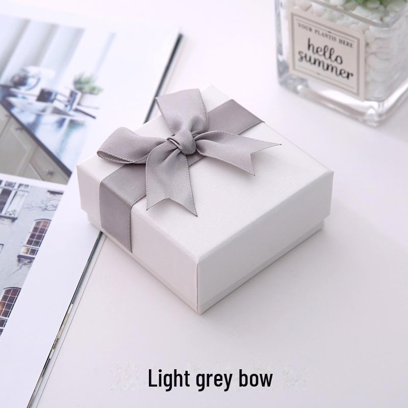 

Елегантна подарункова коробка для ювелірних виробів з бантиком - Високоякісна сувенірна упаковка 7.5X7.5X3.5 cm