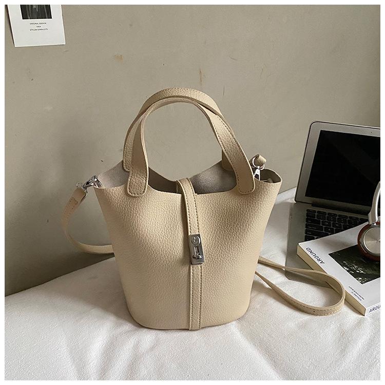 Fashion vegetable basket bucket bag women's 2025 autumn new high-value shoulder bag simple solid color niche messenger bag