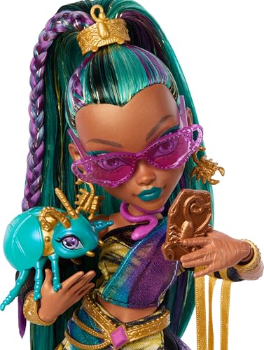 Includes Monster High Nefera de Nile doll in a royal mummy dress and pet scarab plush plush and 7 accessories including a purse, laptop, sunglasses, d