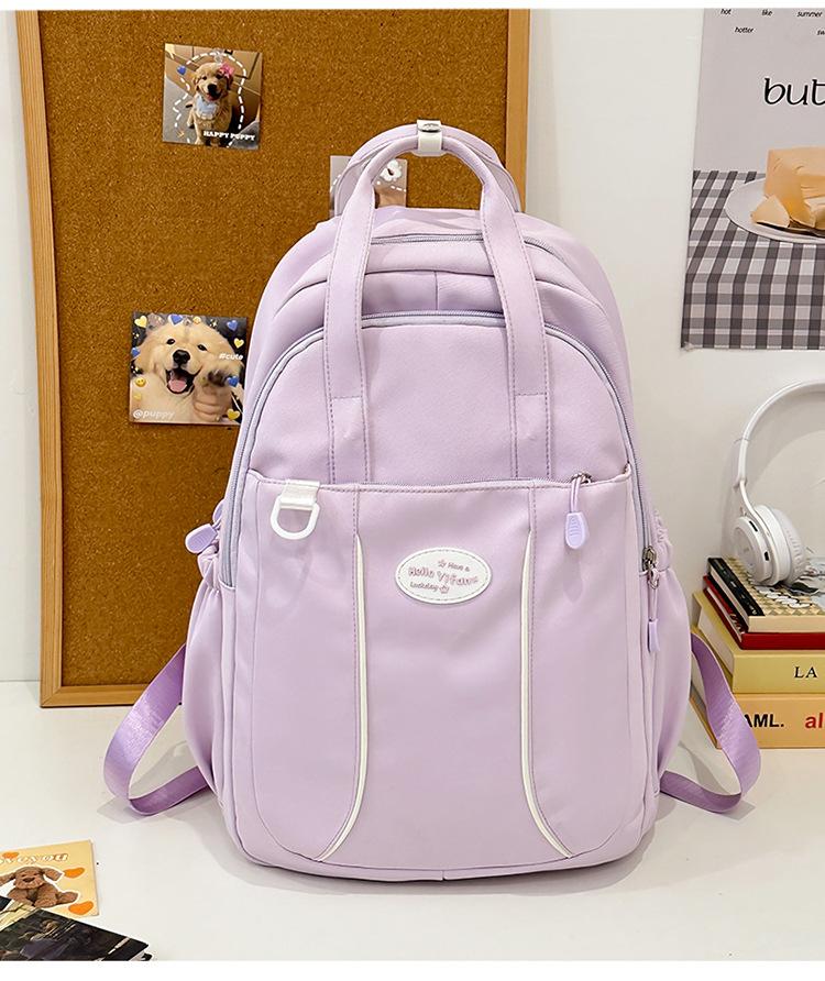 

School bag Korean version candy color simple large capacity 3-6 grade school bag waterproof lightweight versatile backpack leisure travel bag