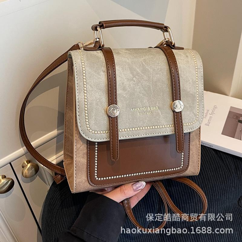 Schoolbag schoolbag backpack women's 1011 new fashion high sense commuter backpack retro travel student handbag