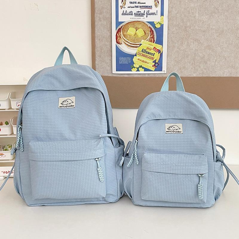 Schoolbag small fresh student schoolbag female Japanese cute solid color simple primary and secondary school student backpack leisure travel backpack