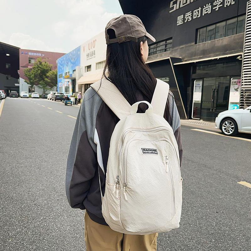 Schoolbag Korean version of simple student backpack male and female college students casual versatile backpack sports cycling tooling bag