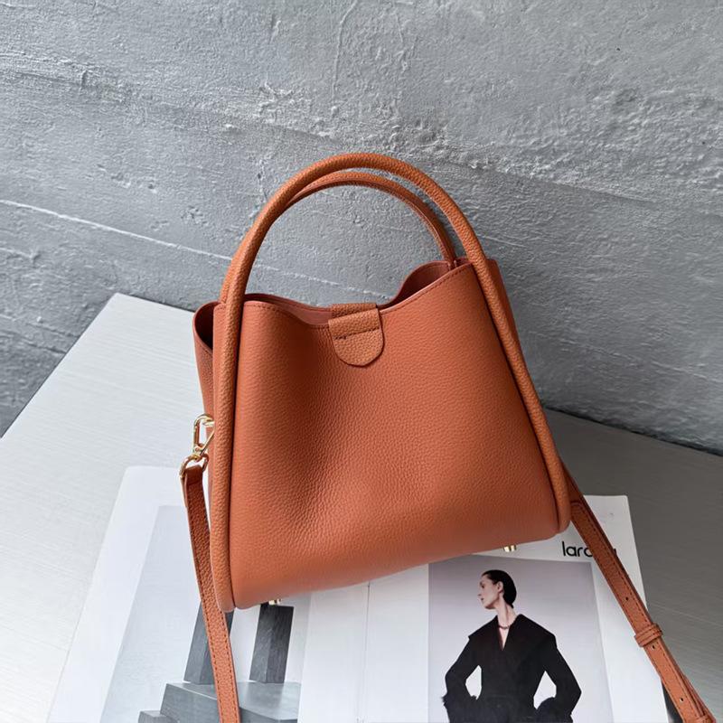 

2025 Новая женская сумка Большая вместимость Верхний слой Коровья кожа Натуральная кожа Сумка-корзина Сумка-ведро Мамина Одноплечевая Кроссбоди Сумка 25*20*16 золотисто-коричневый