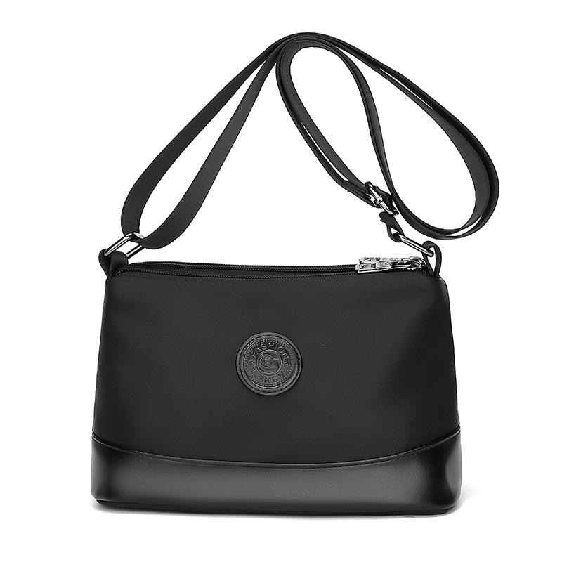 

Contrasting colors trendy women s bags new casual and light commuting Oxford cloth shoulder bag three-layer large-capacity messenger bag чёрный