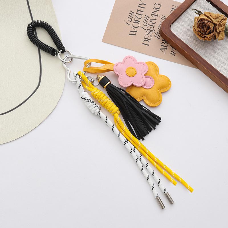 

Yogodlns 1Pcs Fashion Faux Leather Flower Tassel Braided Rope Bag Charms Pendant For Women Handbag one size