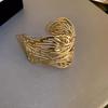 Trendy European & American Exaggerated Metal Hollow Armlet: Niche High-End Women's Jewelry