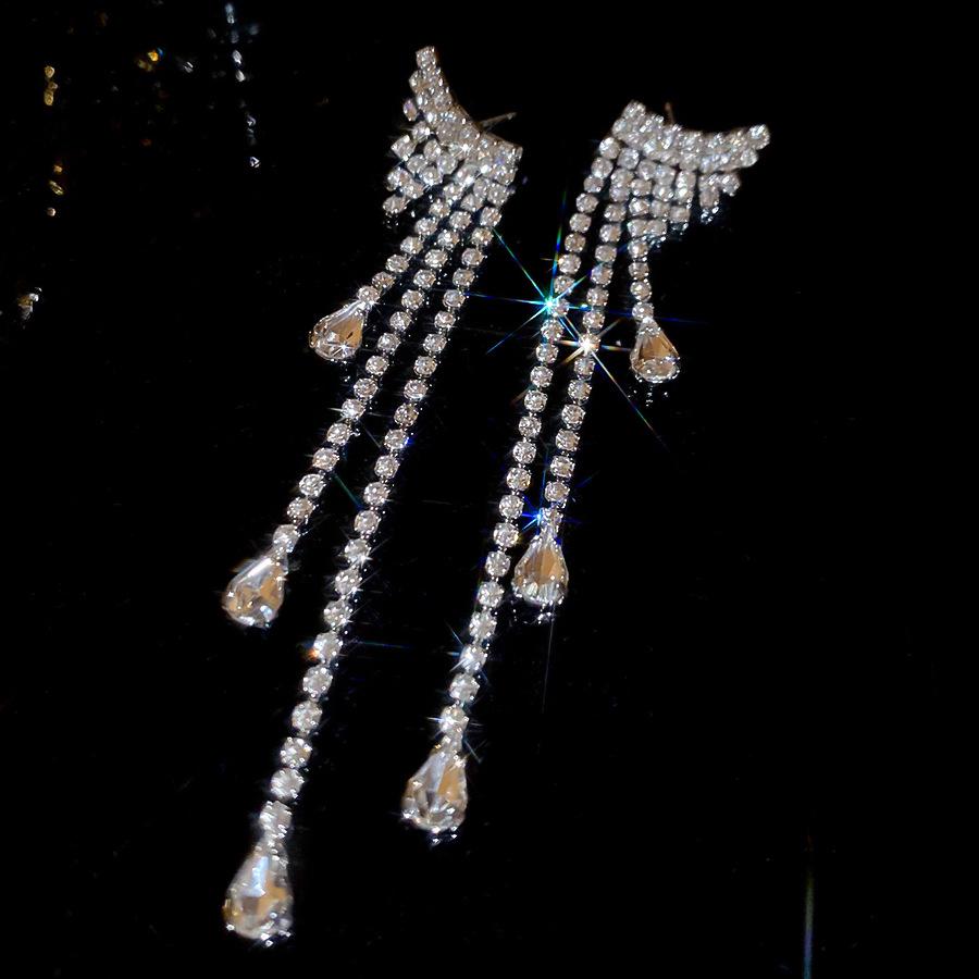 

Silver Needle Exquisite Zircon Geometric Tassel Earrings: Luxurious, Fashionable Stud Earrings for Women with a Bold, Unique Flair.