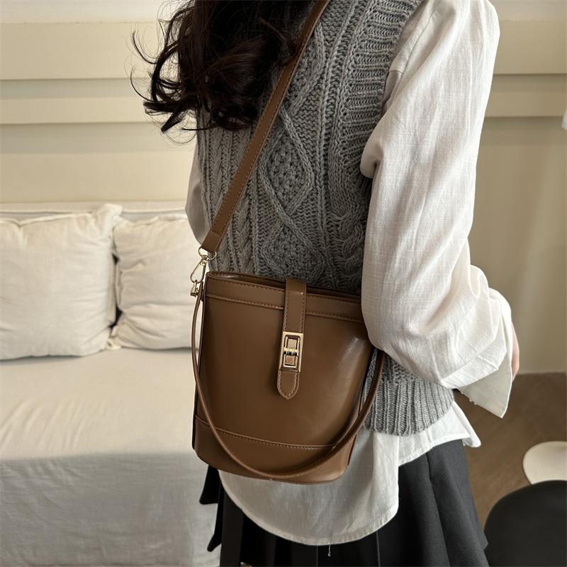 Korean temperament niche handbag 2025 spring retro simple bucket bag high-end shoulder bag messenger bag bag