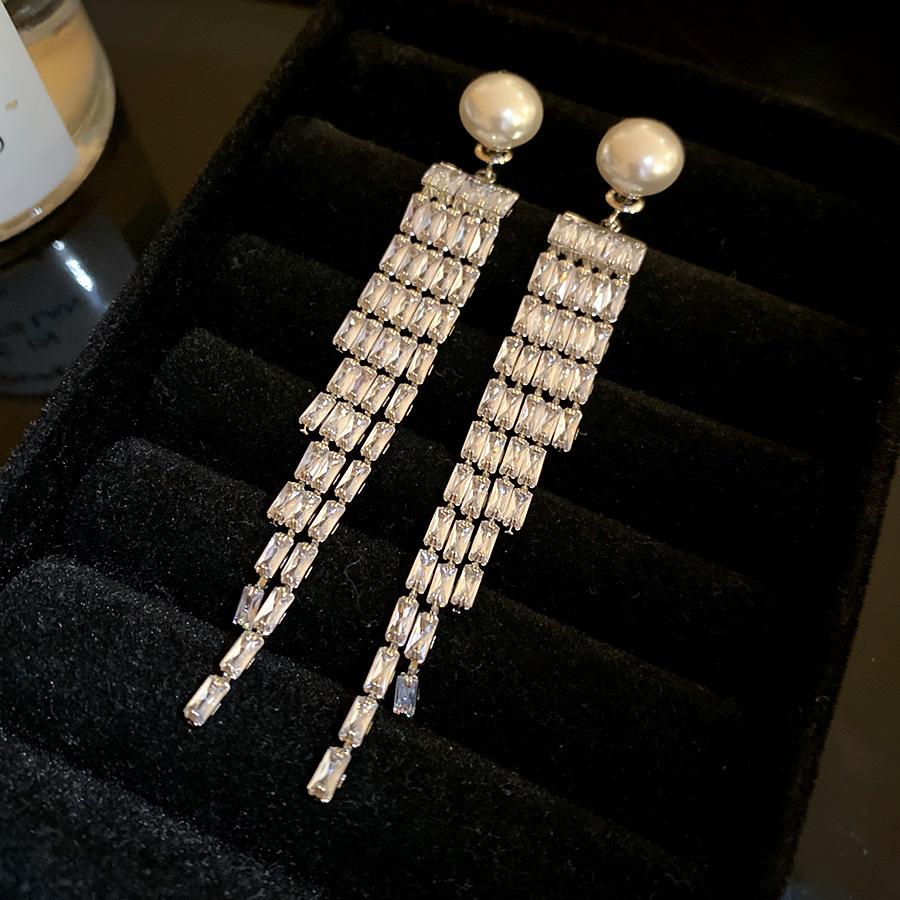 

Silver needle zircon pearl fringed earrings women s cold wind earrings light luxury high-end earrings design sense niche