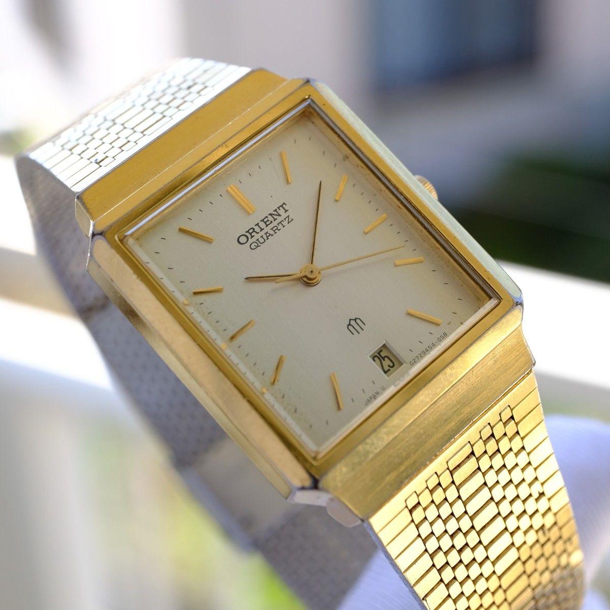Used [In operation] ORIENT quartz watch gold mesh band
