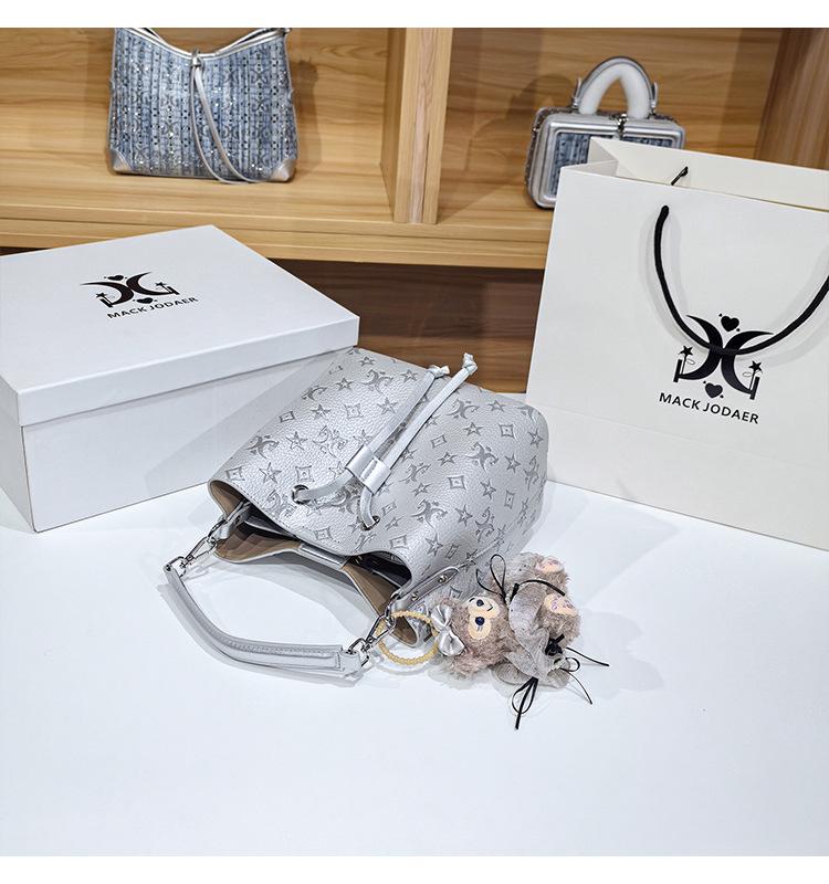 Women's Large Capacity Single Shoulder Bucket Bag with Inner Lining, Compartment Organizer, and Zippered Middle Section.