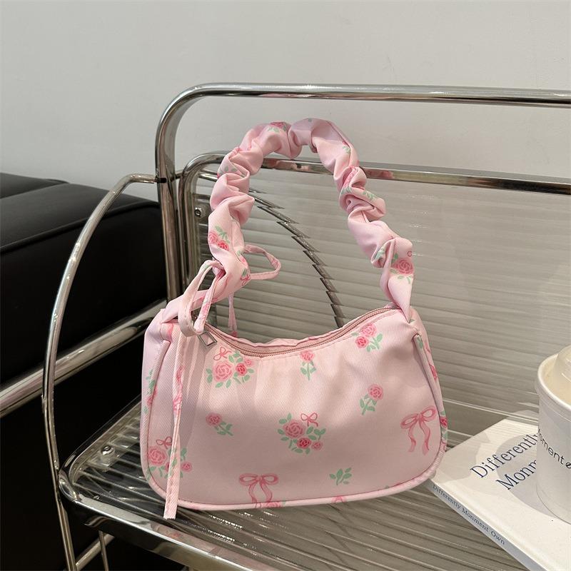 Gentle and sweet flower canvas bag women's new drawstring shoulder bag high value floral bow armpit bag