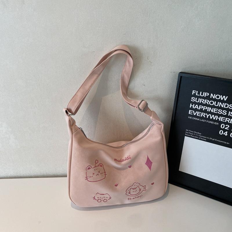 2025 new Korean version of casual niche design tote bag, student class commute fashion soft leather shoulder messenger bag