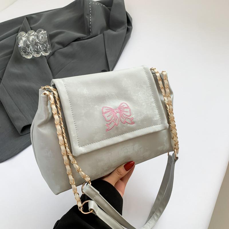 

Stylish Contemporary Medium Size Pu Leather Crossbody Bag With Unique Chain Design Perfect For Everyday Fashion Needs сірий колір