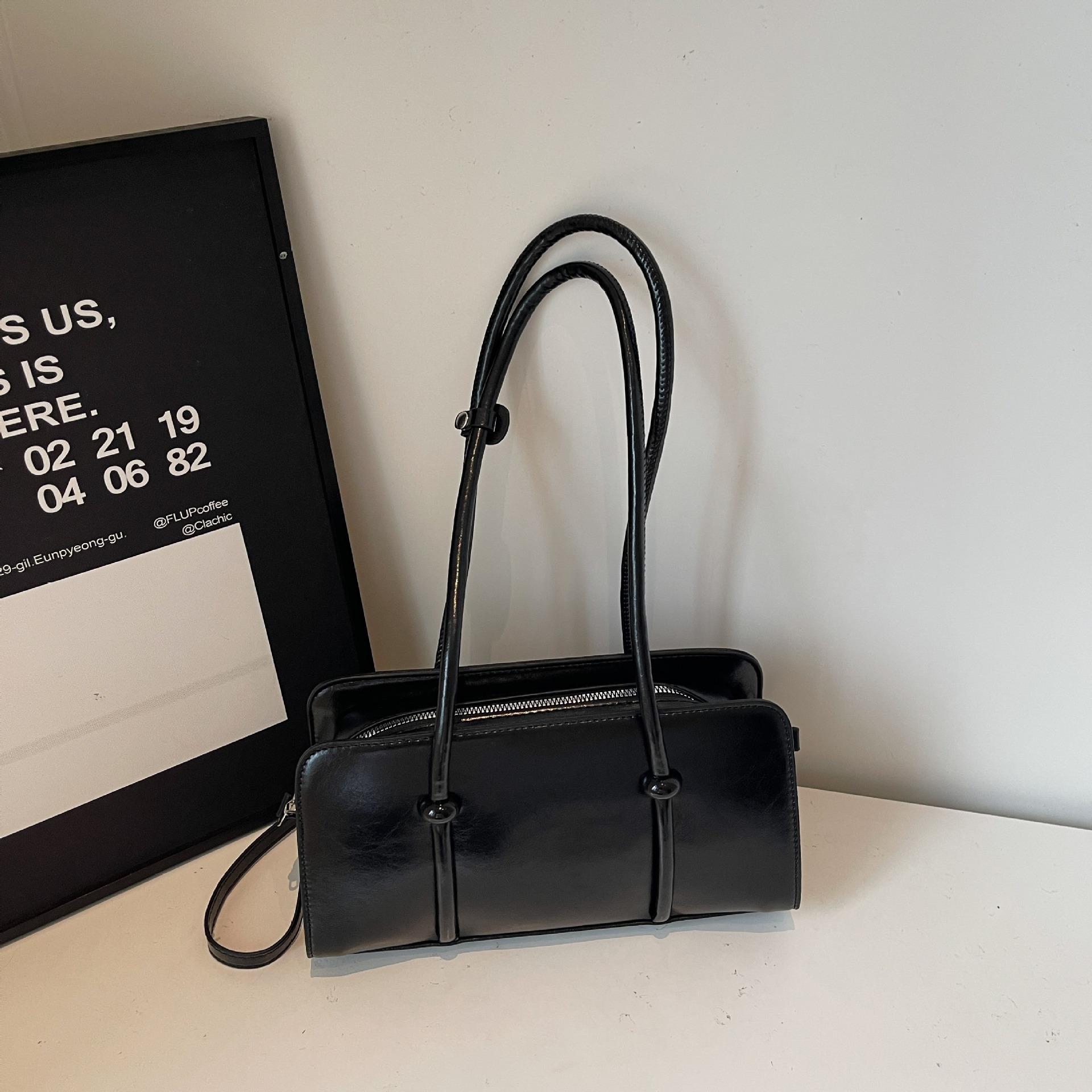 Ретро мода сумка подмышку женская 2025 осень новая высокая стоимость сумка-багет трендовая зарубежная портативная сумка на плечо