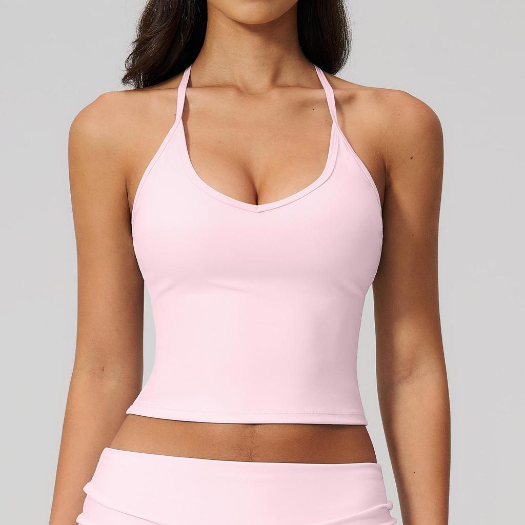 Introducing the Stylish Women's Quick-Dry Yoga Tank Top: Beautiful Design, Perfect for Fitness & Sports.