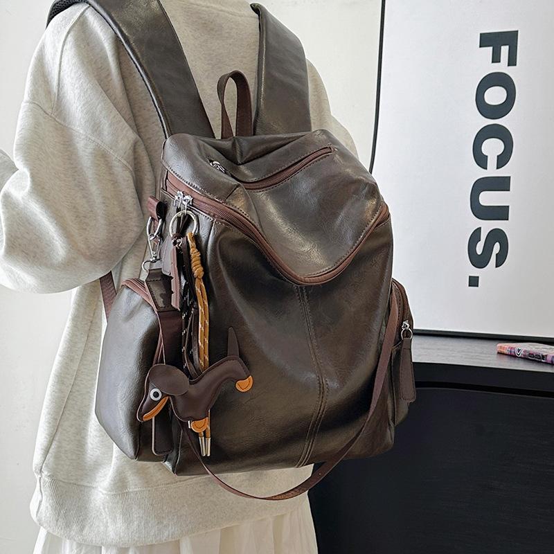 Schoolbag European and American retro soft pu backpack women's 1011 new British style cool sa pu backpack commuter multi-purpose backpack