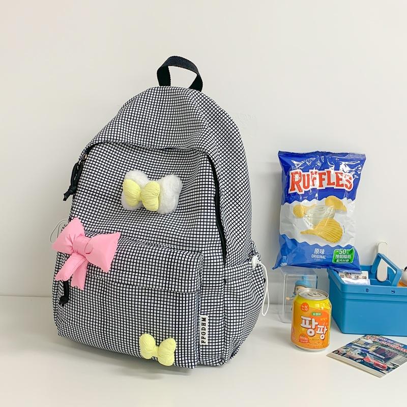 Schoolbag Japanese ins new middle school student schoolbag for women, high value, fresh and full of stars, junior high school students lightweight