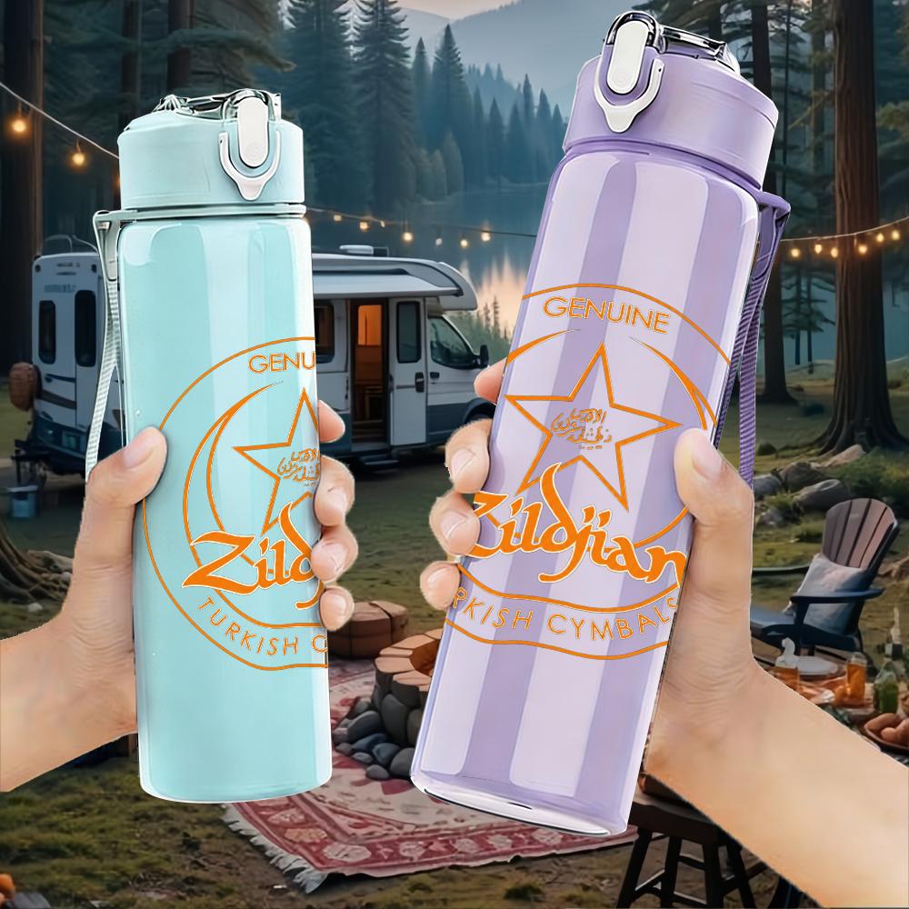1PC Orange circular star emblem print 750ml colorful plastic sports water bottle leakproof pop lid with straw for outdoor office home use