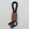 Hand-Woven Cowhide Leather Keychain Pendant with Logo Embossing - High-Quality Anti-Lost Car Lanyard