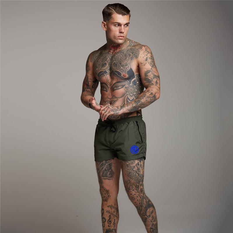 Muscleguys Summer Fitness Gyms Shorts Muscle guys Breathable Comfortable Shorts Men Workout Running Short Pants Sportwear Shorts