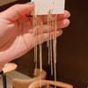 Light luxury high-end sense gold long fringed temperament earrings fashionable atmosphere versatile stud earrings personalized daily earrings