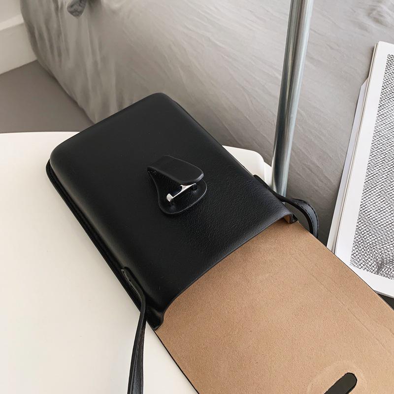 Versatile Vertical Crossbody Bag: Compact Single Compartment