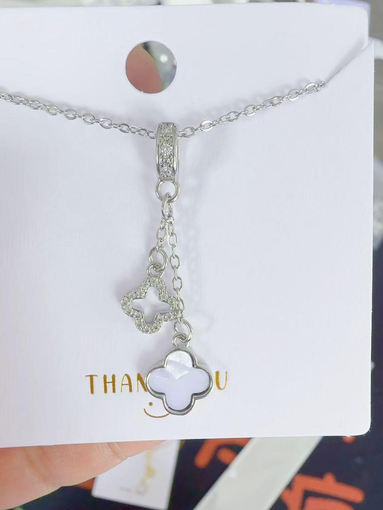 European & American Luxury Tassel Hollow Mother-of-Pearl Clover Pendant Diamond Necklace for Women - High-End Fashion Jewelry