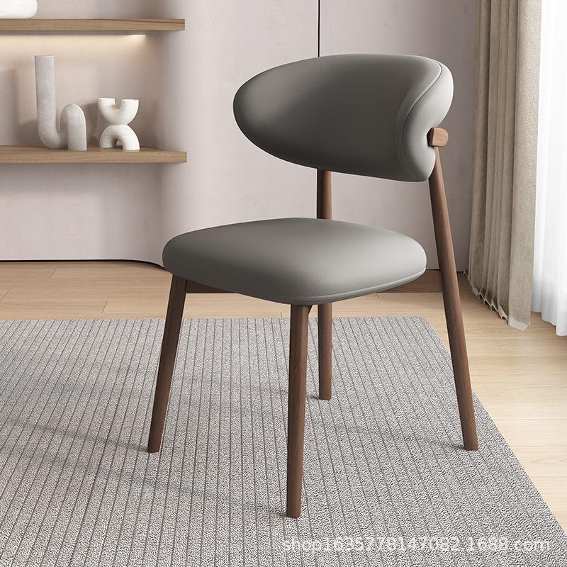 Nordic Modern Minimalist Solid Wood Dining Chair with Soft Pack Backrest - Comfortable Light Luxury Ram's Horn Design for Home, Restaurant, and Hotel.