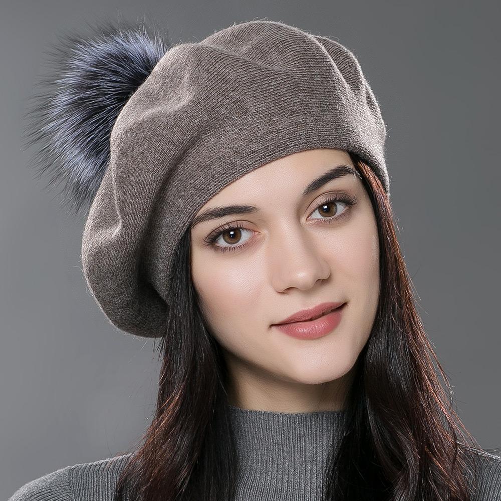 A Women's Beret Knitted Wool Hat with Fur Ball, Fashionable European and American Popular Hat, Autumn and Winter Thick Ear Protection Wool Hat