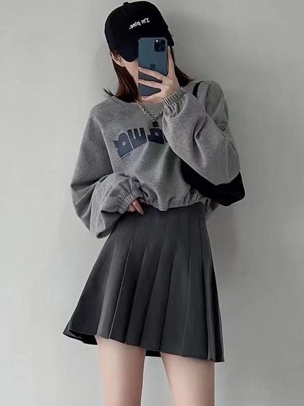 Korean-Style JK Pleated Skirt: Short, Versatile Student Skirt with Safety Pants, Zipper, and Buttons.