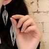Minimalistiska Geometriska Håliga Ovala Örhängen med Tofsar för Kvinnor Överdrift Personlighet Mångsidiga Zirkon Vardagliga Accessoarer