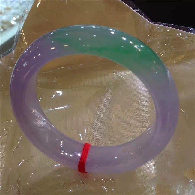 Myanmar Jade Bangle with Green Flecks, Ice-Like Texture, Violet Hue, Round Shape, Spring Colors, Wide Bright Green Design
