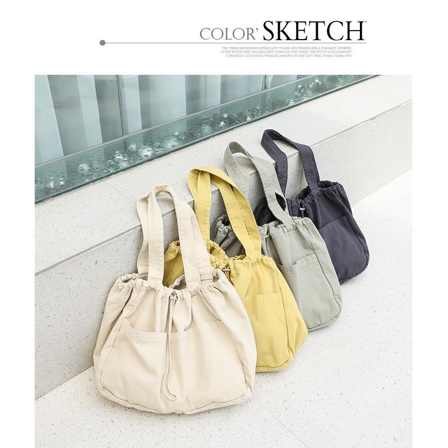 IELGY Japanese casual drawstring bundle handbag, retro washed canvas fashionable solid color shoulder women's bag
