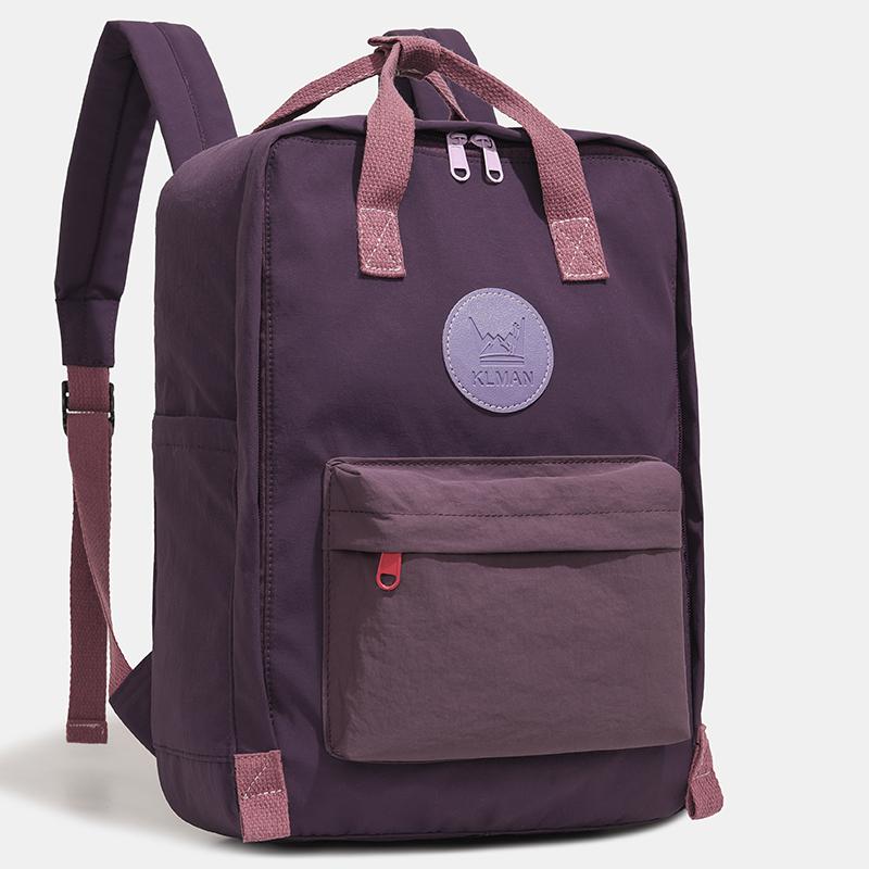 Farbblock-Rucksack mit Fronttasche und gepolsterten Schultergurten